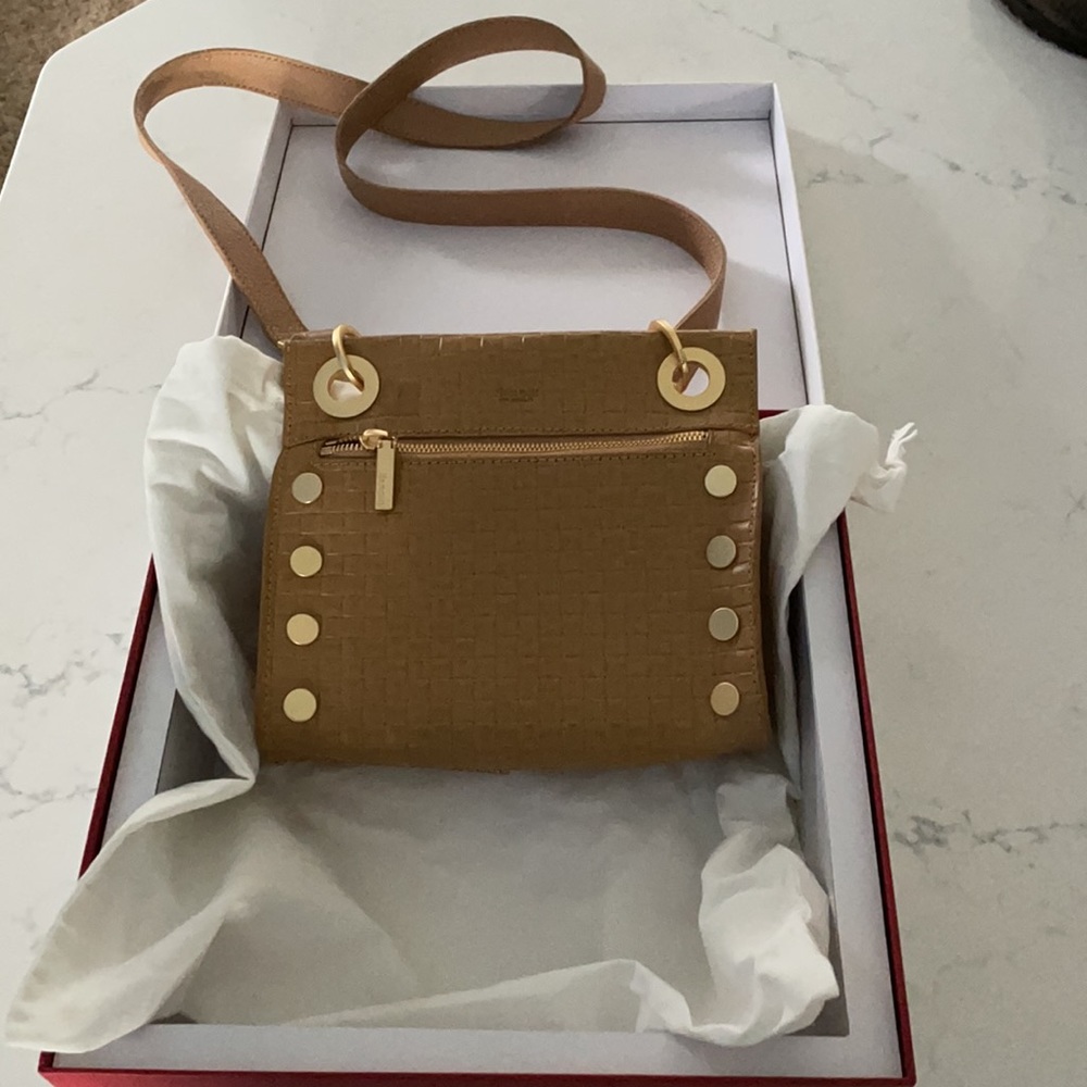 Hammitt Tony tan weave light caramel small leather bag with crossbody strap.